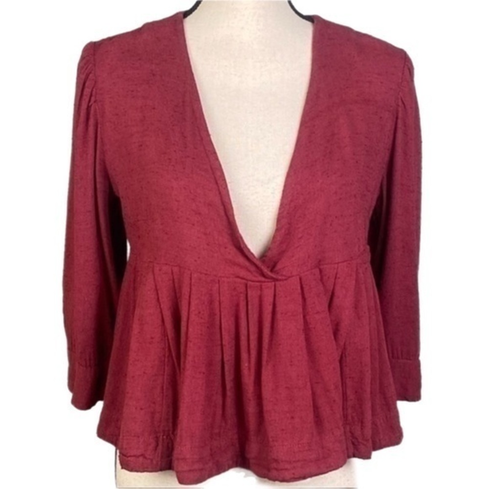 FREE PEOPLE deep red “Pleats on Me” peplum swing blouse in size Small. EUC